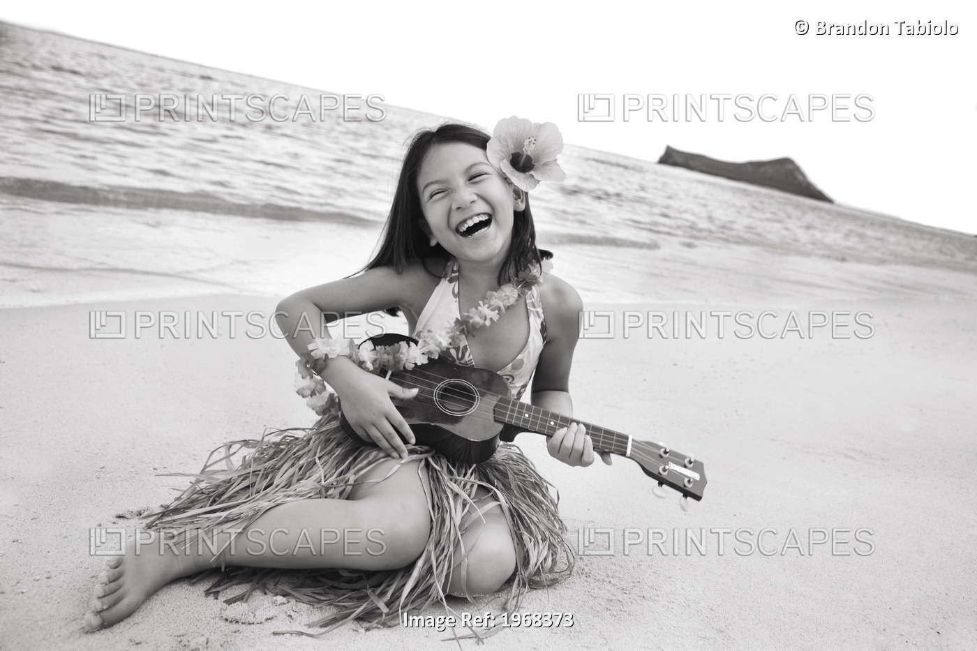 Hawaii, Oahu, Young Girl Smiling And Playing Ukulele On The Beach In A Hula ...