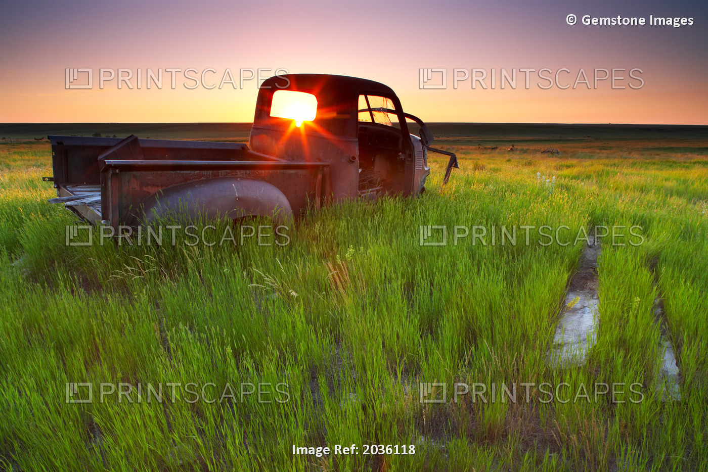 Old Abandoned Pick-Up Truck Sitting In A Field At Sunset, Southwestern ...