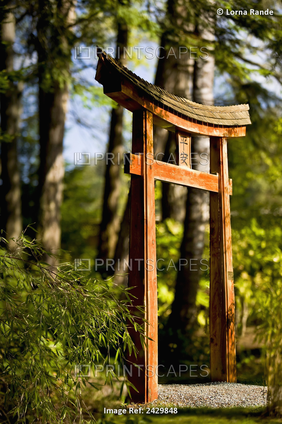 Arch On Pathway In The Japanese Gardens; Mayne Island, British Columbia, Canada