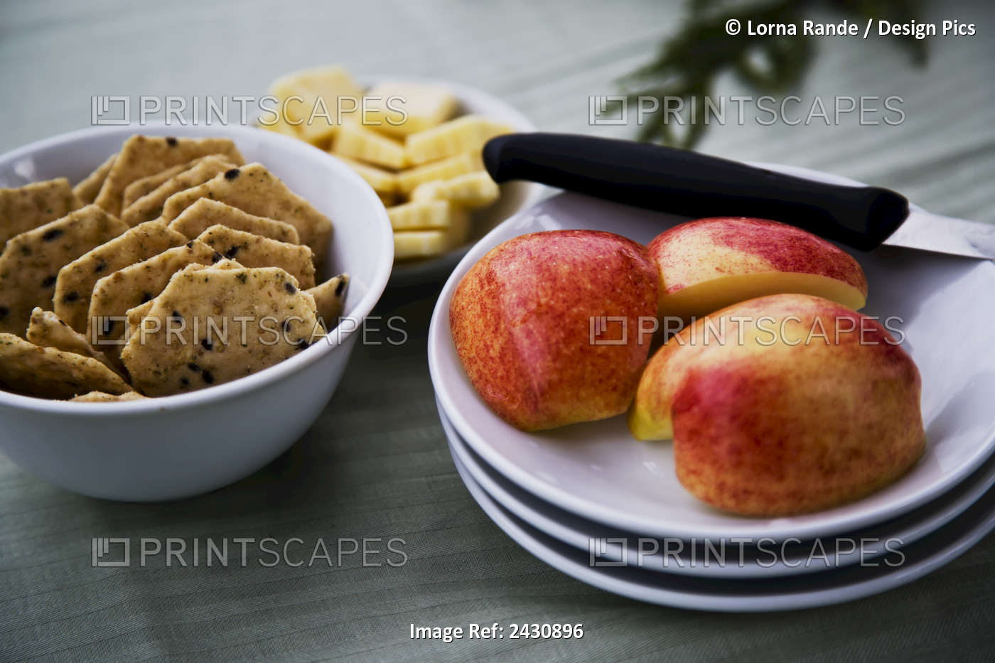 A Snack Of Cut Apples, Crackers And Cheese; Abbotsford, British Columbia, Canada