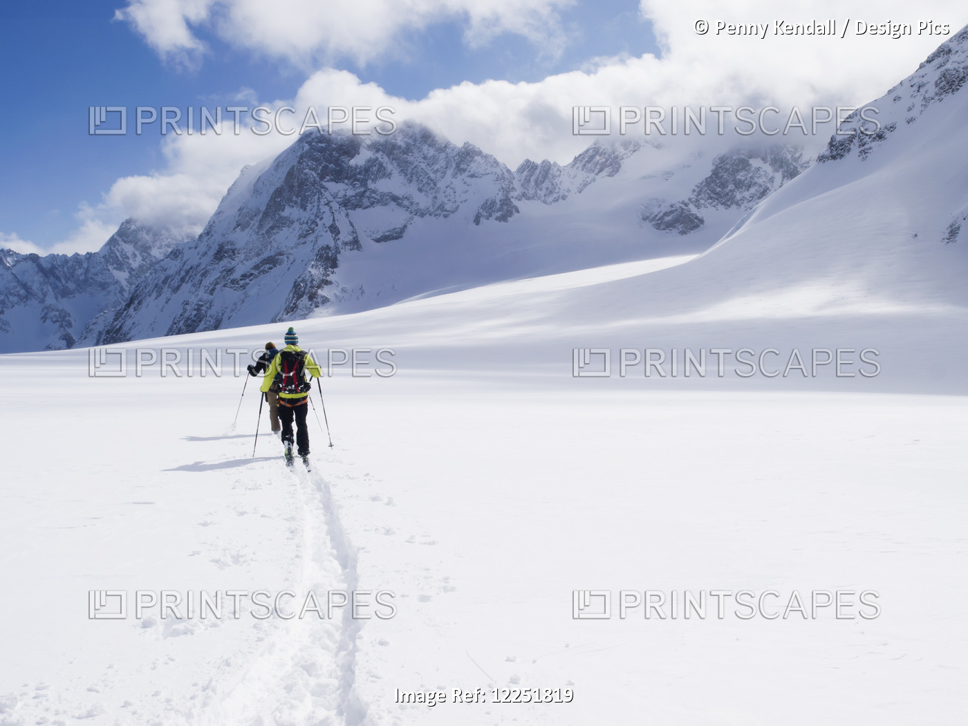 Two Skiers Ski Touring Across The Ottemma Glacier; Switzerland
