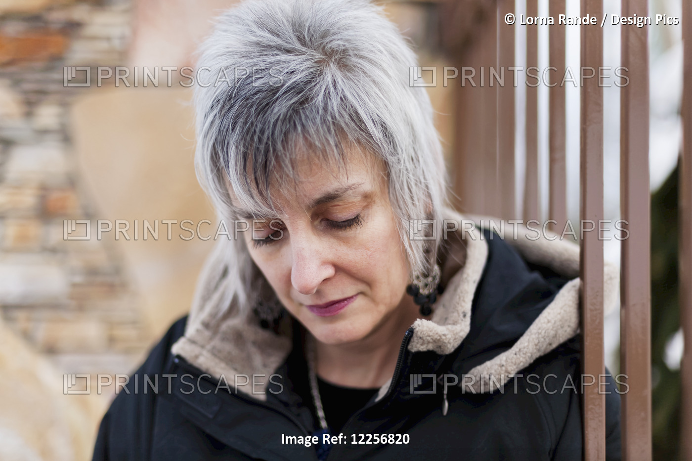 Grey-Haired Woman With Fashionable Haircut Looking Down; Langley, British ...