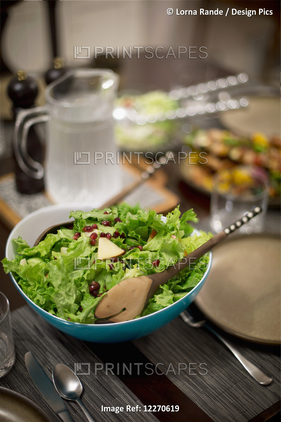 Salad On A Table Set For Dinnertime; Vancouver, British Columbia, Canada