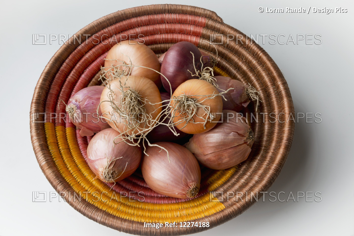 Organic Onions And Shallots In A Rwandan Basket; Rwanda