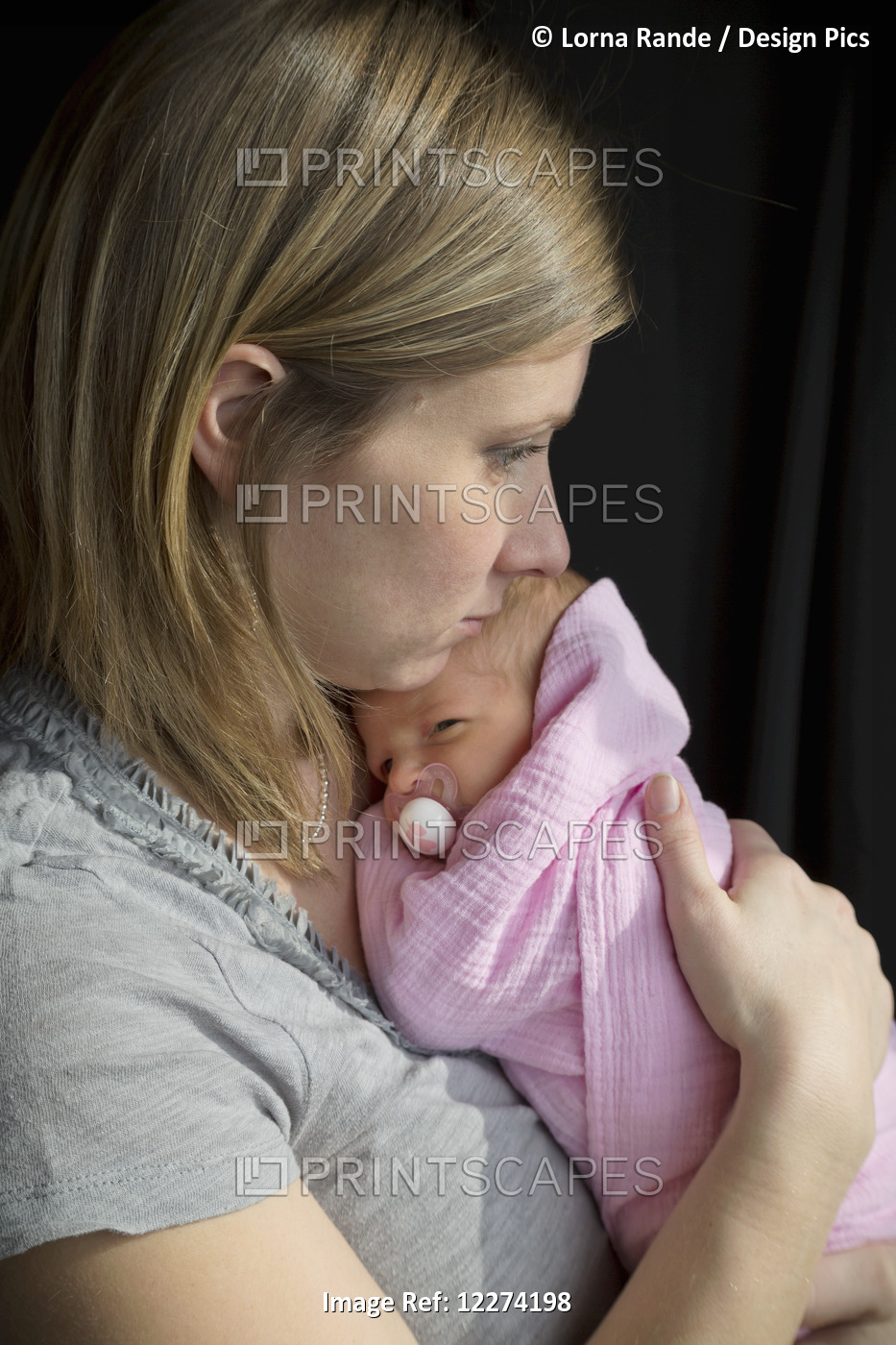 A Mother Holds Her Newborn Daughter; Chilliwack, British Columbia, Canada