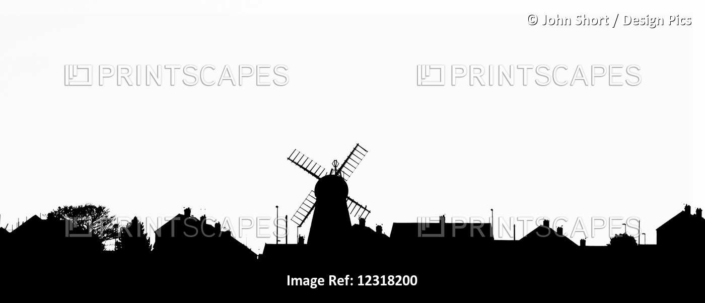 Silhouette Of A Skyline With A Windmill And Houses; Whitburn, Tyne And Wear, ...