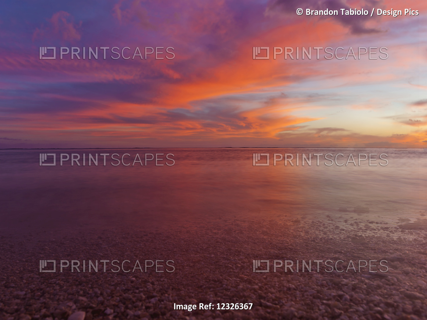 A Dramatic Beachscape With Sunset Colours Of The Sky And Ocean Taken In Long ...