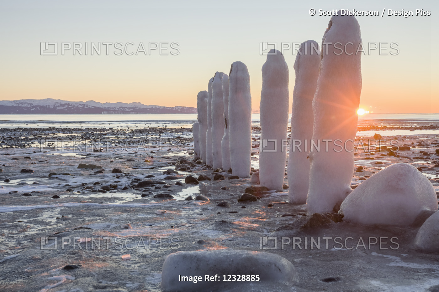 Rocks And Pilings Covered With Snow And Ice Along The Shore At The Water's ...
