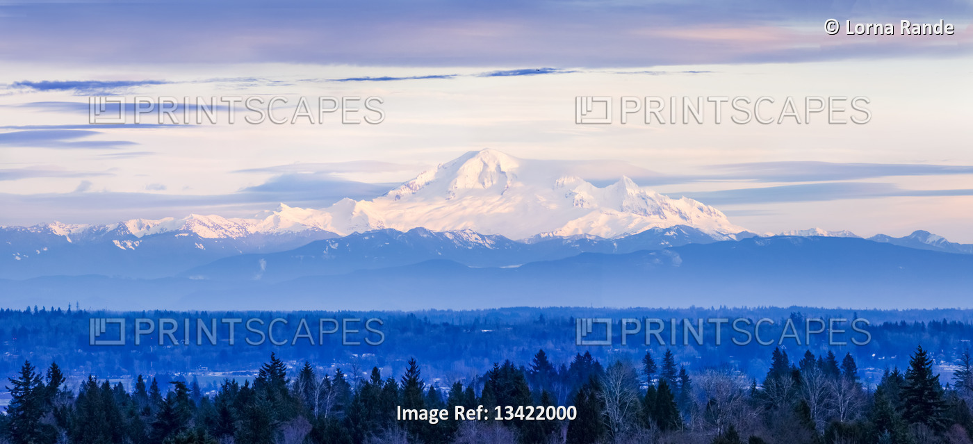 View of snow-covered mountains from Surrey, BC; Surrey, British Columbia, Canada