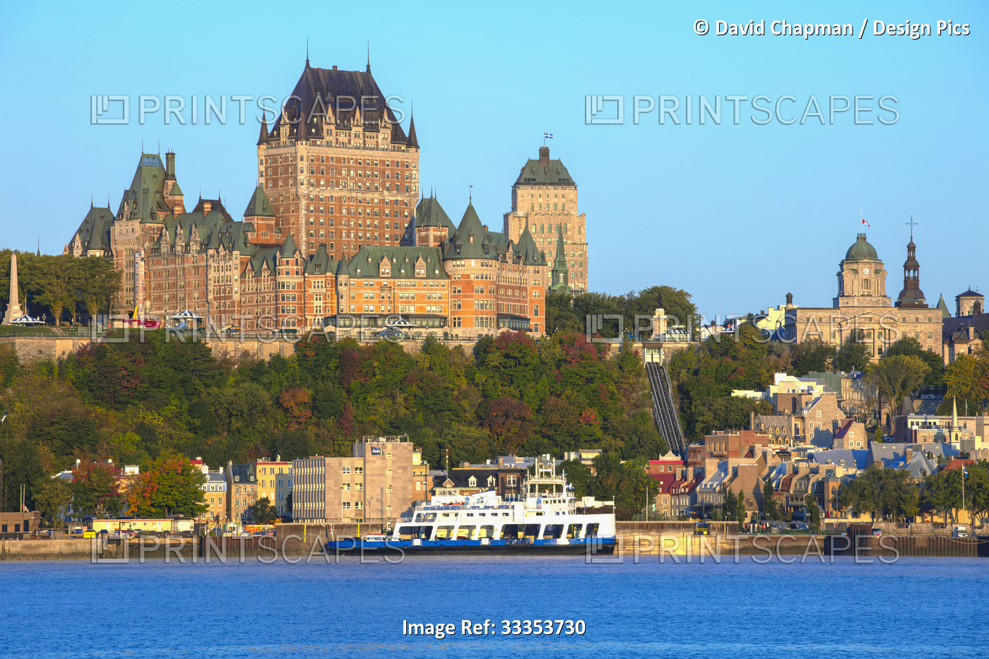 Chateau Frontenac and a boat on the Saint Lawrence River; Quebec City, Quebec, ...