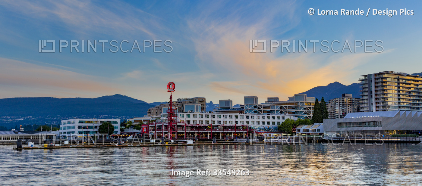 Sun rising over Lonsdale Quay in North Vancouver, BC, Canada; North Vancouver, ...