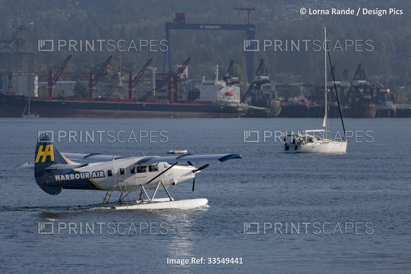 Float plane and sailboat in the harbour of Vancouver; Vancouver, British ...