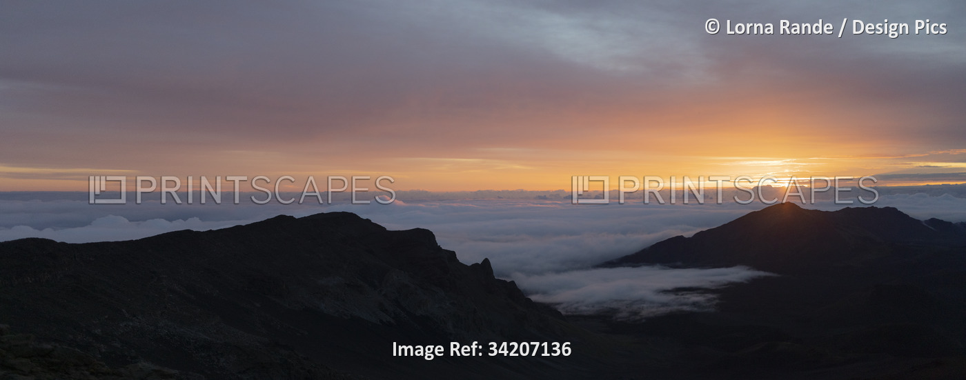 Scenic view of Haleakala from mountain top overlooking the Pacific Ocean above ...