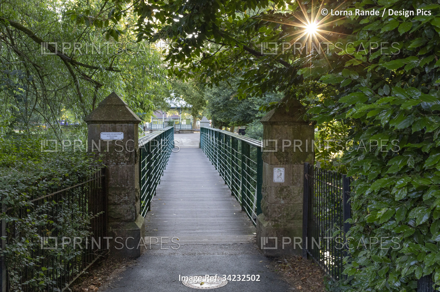 Walkway across River Derwent in Matlock, Derbyshire, UK; Matlock, Derbyshire, ...