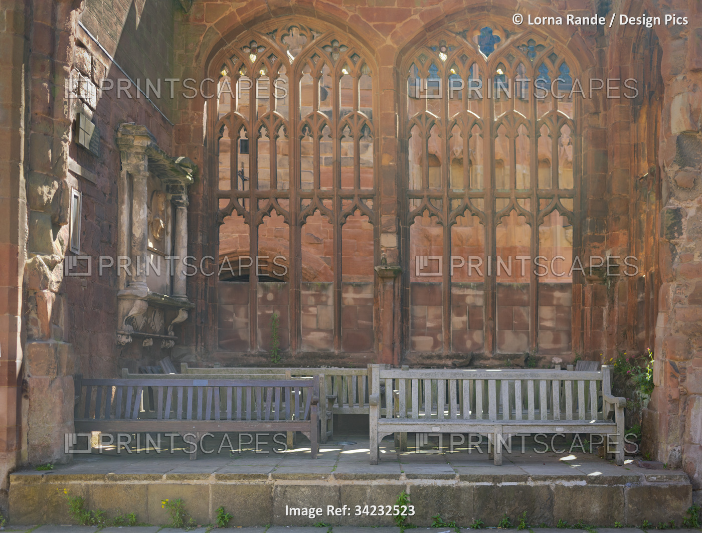 Old remains of the Coventry Cathedral standing in defiance to the 1940 bombing, ...